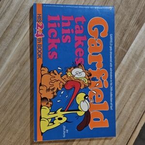 : Takes His Licks - Blue & Orange Coffee Table Book